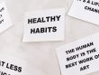 Motivational cards promoting healthy habits and positive thinking for lifestyle change.
